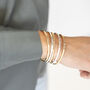 Inspiration Slim Brass Bangles In Gold Or Silver Finish, thumbnail 6 of 12