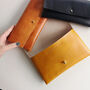 'Hidden Message' Personalised Leather Clutch Bag, thumbnail 1 of 12