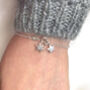 Personalised Sterling Silver Snowflake And Initial Star Necklace, thumbnail 8 of 9