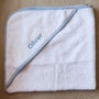 Personalised Baby Hooded Towel Edged In Blue Gingham, thumbnail 4 of 6