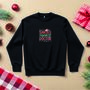 Santa’s Favourite Doctor Christmas Jumper – Unisex Black Festive Sweatshirt, thumbnail 1 of 4