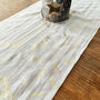 Holly Leaves Christmas Table Runner, Cream And Gold Muslin, thumbnail 6 of 8