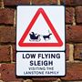 Low Flying Sleigh Personalised Christmas Road Sign, thumbnail 1 of 2