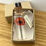 Tiny Gerbera Daisy In A Bottle With Personalised Tag, thumbnail 8 of 11