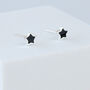 Sterling Silver Tiny Black Star Studs, thumbnail 1 of 4