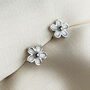 Sterling Silver Tiny Black Or White Flower Stud Earrings, thumbnail 5 of 9