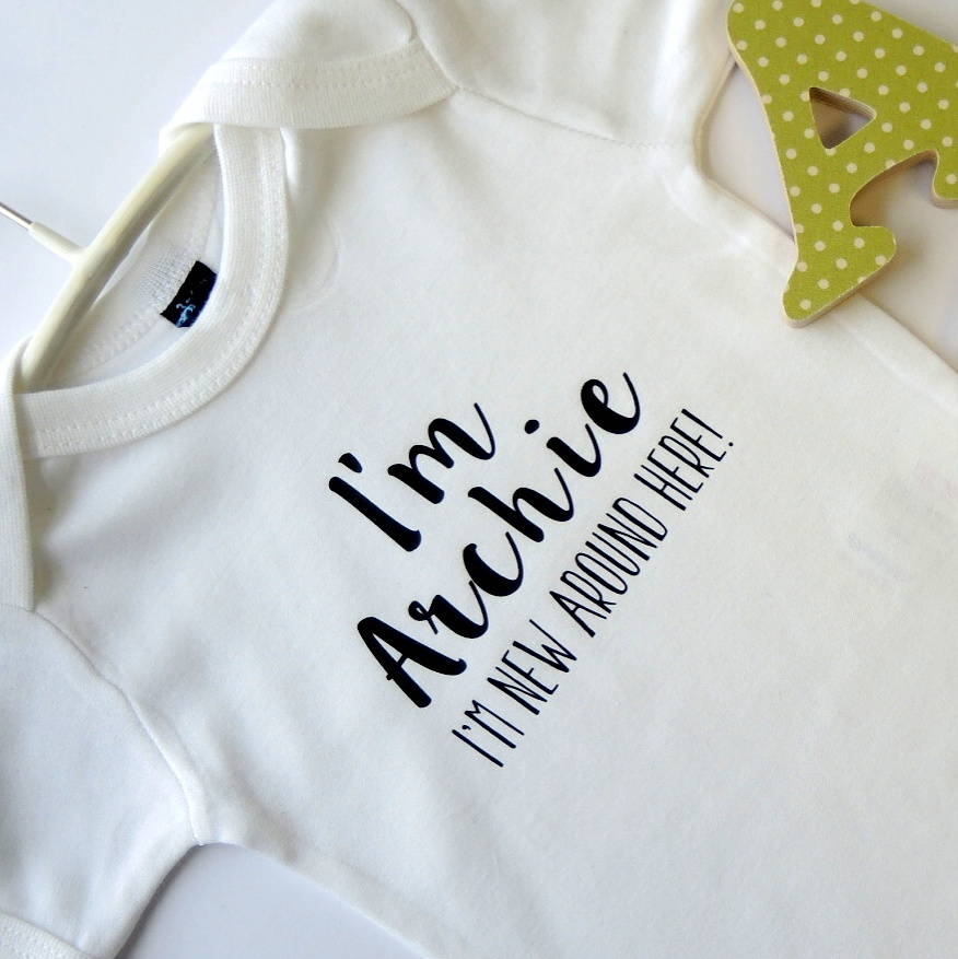 Personalised 'New Around Here' Baby Vest By The Alphabet Gift Shop