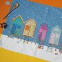 Norfolk Beach Huts Christmas Tea Towel, thumbnail 1 of 3