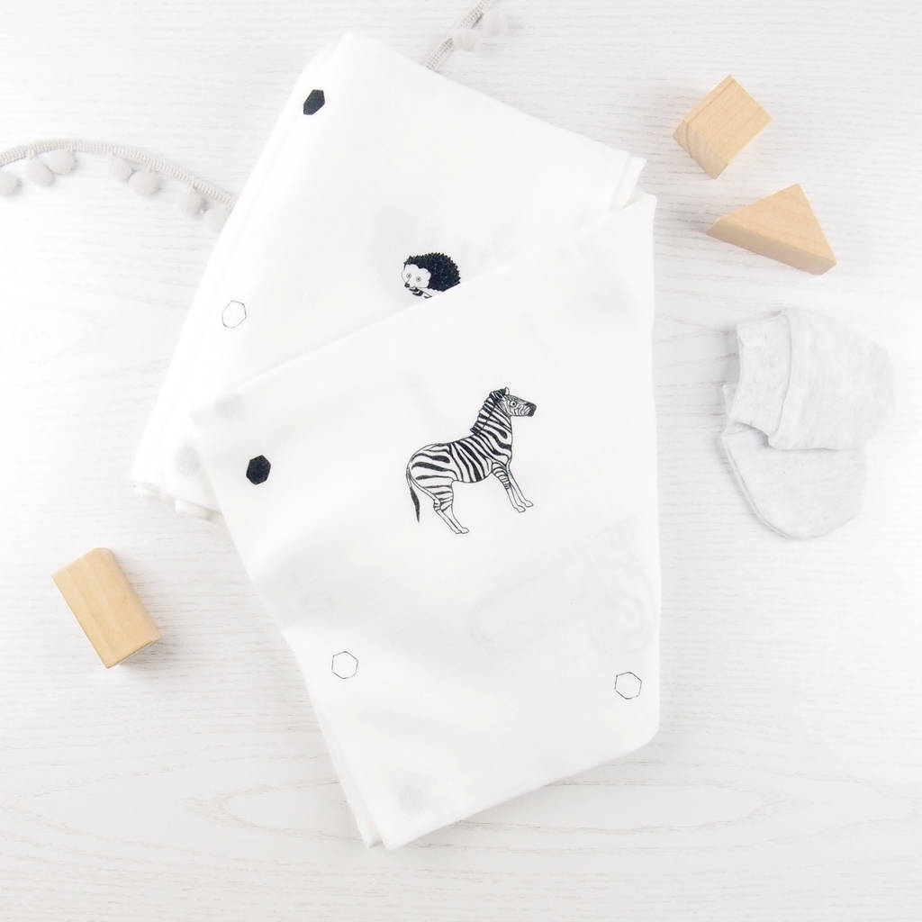 monochrome muslin swaddle blanket with animals by the little black