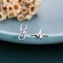 Mismatched Stethoscope And Heartbeat Stud Earrings In Sterling Silver, thumbnail 1 of 10