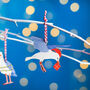 Set Of Three Festive Seagull Christmas Decorations, thumbnail 2 of 3