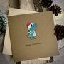 Personalised Dinosaur Pom Pom Happy Christmas Card, thumbnail 1 of 2