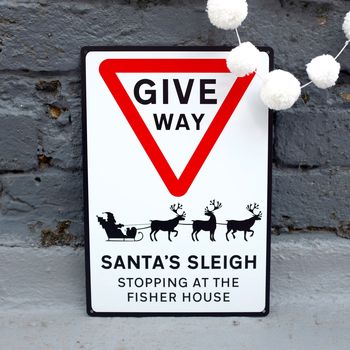 Christmas Give Way Metal Road Sign, 2 of 3