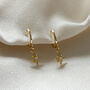 Opal North Star Huggie Hoop Earrings, thumbnail 1 of 2