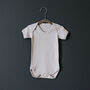 Personalised New Baby Gift Surname Bodysuit With Bow Frame, thumbnail 4 of 6