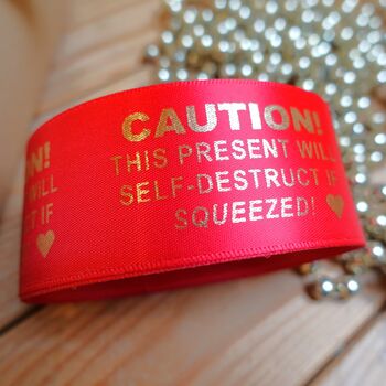 'This Present Will Self Destruct If Squeezed!' Ribbon, 2 of 3