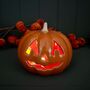 Porcelain Light Up Pumpkin Halloween Decoration, thumbnail 1 of 3