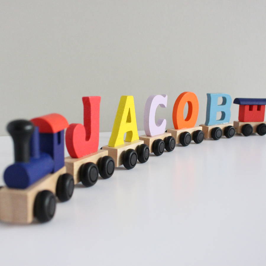 Personalised Coloured Wooden Name Train And Gift Bag, 1 of 8