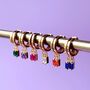 Gold Plated Huggie Hoop Earrings With Baguette Stones, thumbnail 2 of 12