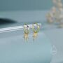 Sterling Silver Palm Tree Huggie Hoops, thumbnail 2 of 11