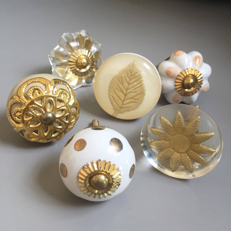 set of assorted gold drawer knobs by french grey interiors