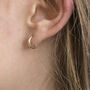 9ct Solid Gold Huggie Hoop Earrings, thumbnail 4 of 8