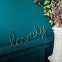 'Lovely' Gold Wire Word Sign, thumbnail 1 of 3