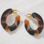 Hortense Flat Oval Resin Hoops Orange / Black, thumbnail 1 of 3