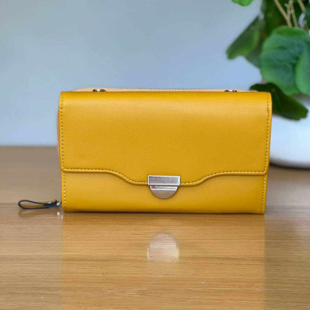 Clutch Bag With Strap In Yellow By Nest