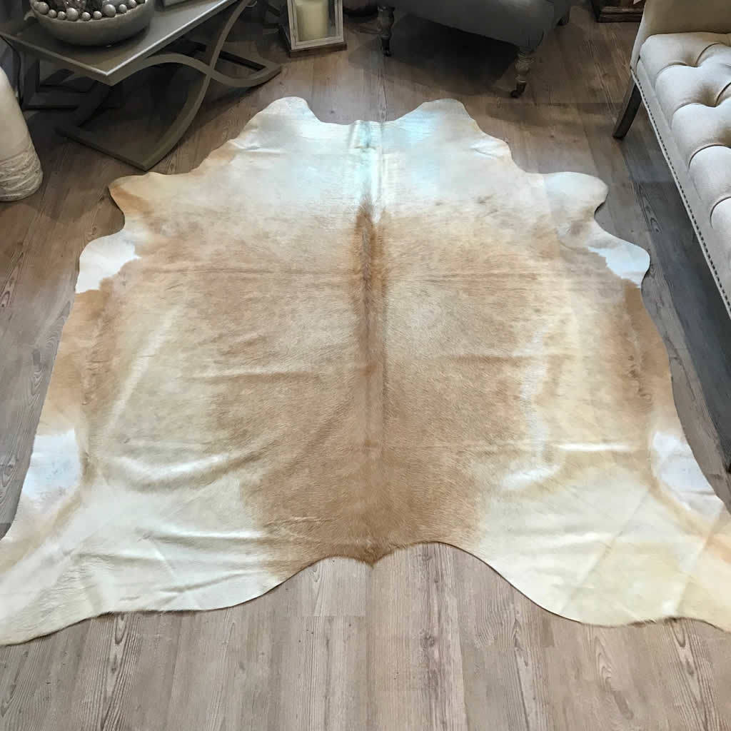 cowhide rug caramel gold and cream by cowshed interiors
