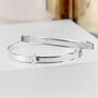 Child's Sterling Silver Expanding Bangle With Star, thumbnail 1 of 5