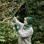 Fair Trade Unisex Cosy Cable Knit Wool Bobble Hat, thumbnail 3 of 12