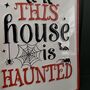 Metal 'This House Is Haunted' Halloween Sign, thumbnail 2 of 3