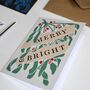 Luxury Linocut Mistletoe Christmas Art Card, thumbnail 1 of 7