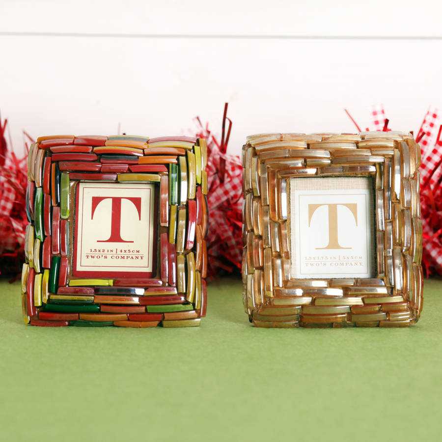 mini picture frame decoration or place setting by red berry apple