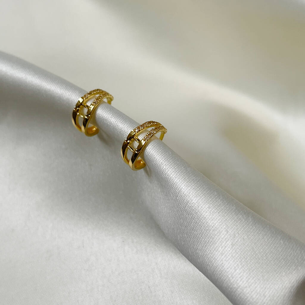 Gold Plated Huggies With White Topaz Stones By Katie Belle