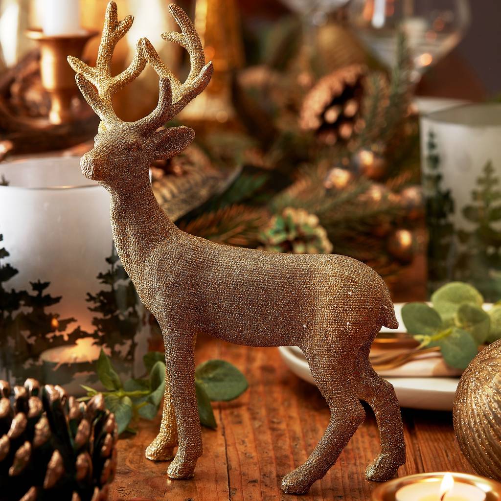 gold reindeer standing christmas decoration by the christmas home