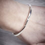 Twisted Tiny Text Personalised Silver Message Bangle, thumbnail 1 of 5
