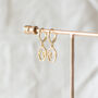 Abstract Face Huggie Hoop Earrings, thumbnail 3 of 9
