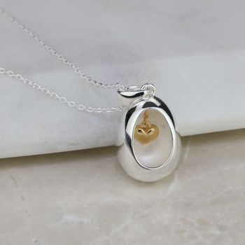 Oval Pendant With Miniature Hanging Heart, 5 of 6