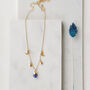 Gold Plate Lapis Lazuli Moon And Stars Charm Necklace, thumbnail 3 of 5