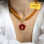 Mustard Bead And Cranberry Flower Toggle Necklace, thumbnail 1 of 6
