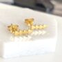 Tiny Gold Plated Arrow Stud Earrings, thumbnail 2 of 4