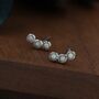 Sterling Silver Tiny White Opal Trio Stud Earrings, thumbnail 1 of 12
