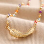 Rainbow Beaded Feather Charm Necklace In Gold Plating, thumbnail 3 of 6