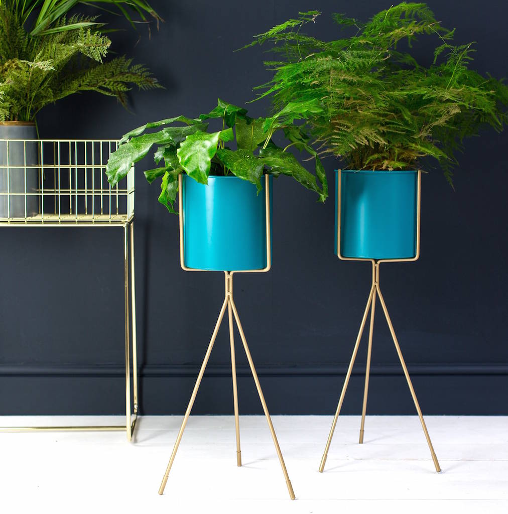 teal and gold tall plant stand