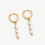 Gold Pearl Huggie Hoop Earrings, thumbnail 1 of 4