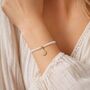 Gold Plated White Bead Filigree Teardrop Bracelet, thumbnail 1 of 9