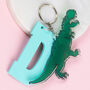 Personalised Dinosaur Book Bag Initial Keyring Charm, thumbnail 1 of 4