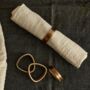 Tyra Brass Napkin Rings Set Of Four, thumbnail 3 of 4